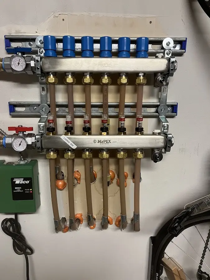 Plumber performing Water Heater Repair at a residential property in Charlotte